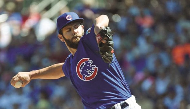 Chicago Cubsu2019 Jake Arrieta pitches against the Cleveland Indians at Sloan Park on March 9, 2016 (AFP)