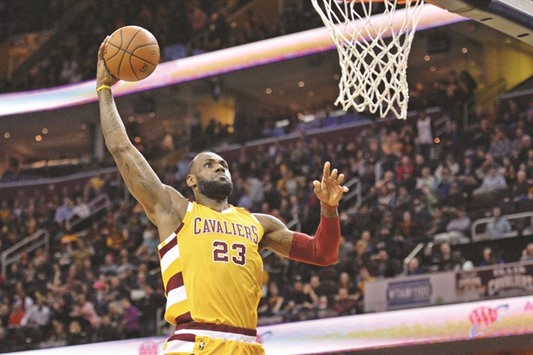 Cleveland Cavaliers forward LeBron James slam dunks against the Atlanta Hawks during the first quarter at Quicken Loans Arena on Monday. PICTURE: USA TODAY Sports