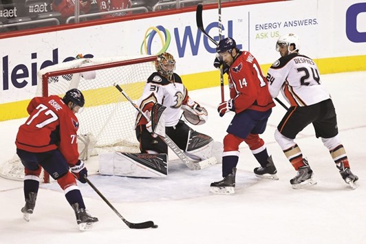Anaheim Ducks goalie Frederik Andersen makes a save on Washington Capitals right wing T.J. Oshie (R) in the third  period at Verizon Center. PICTURE: USA TODAY Sports