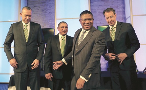 Minister of Sport Fikile Mbalula (2nd R)  gestures after the appointment of the new Springboks rugby coach Allister Coetzee (2nd L) as the president of South African Rugby Union Oregan Hoskins (L) and the CEO of South African Rugby Union Jurie Roux look on in Randburg, outside Johannesburg, yesterday. (Reuters)