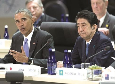 US President Barack Obama speaks alongside Japanese Prime Minister Shinzo Abe at the 2016 Nuclear Security Summit at the Washington Convention Centre in Washington, DC, yesterday.
