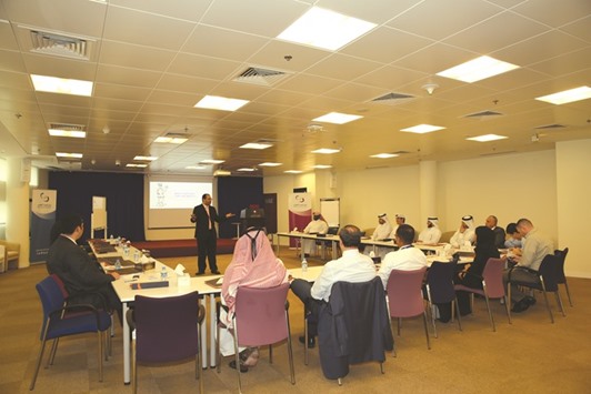 QSE AML/CFT workshop in session. The workshop, attended by all the QSE staff, was aimed at helping its employees understand money laundering, its methods and stages as well as its negative economic impacts.