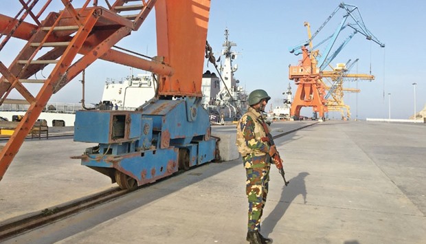 A member of Pakistan Navy is seen at the Gwadar port in Pakistanu2019s Balochistan Province yesterday.