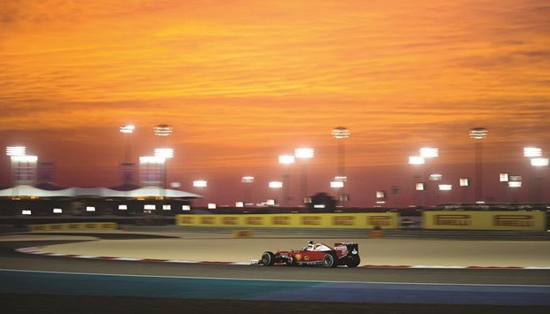 Ferrariu2019s Finnish driver Kimi Raikkonen drives during the second practice session at the Sakhir circuit in Manama yesterday.