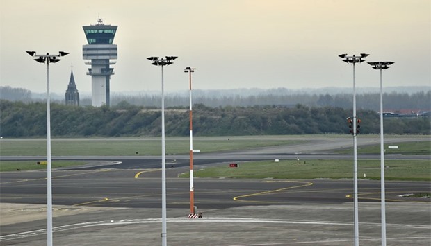 The control tower and an empty tarmac are pictured at the Brussels Airport as air traffic controllers go on strike in Zaventem, Belgium. Reuters