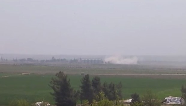 Smoke rising after Katyusha-type rockets hit a target in Kilis