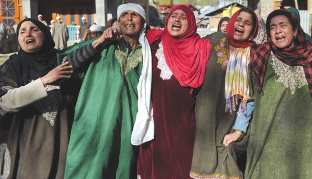 Mourners react during the funeral of Raja Bejum, 70, who was killed in clashes with security forces in Langate near Handwara yesterday.