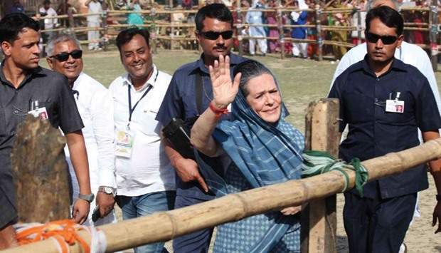 Congress chief Sonia Gandhi waves to party supporters as she arrives to address a rally ahead of the third phase of West Bengal polls at Sujapur in Malda district of West Bengal, yesterday.