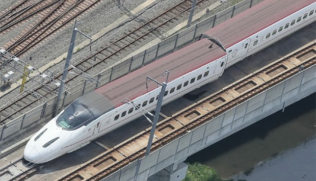 An aerial view shows a derailed Kyushu shinkansen, or bullet train, in the city of Kumamoto, Kumamoto prefecture, after a 6.4-magnitude earthquake hit Japan's southwestern island of Kyushu yesterday.