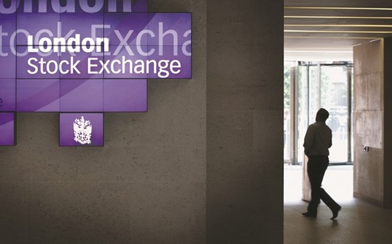 A man walks to the lifts inside the London Stock Exchange. The FTSE 100 closed down 0.3% to 6,343.75 points yesterday.