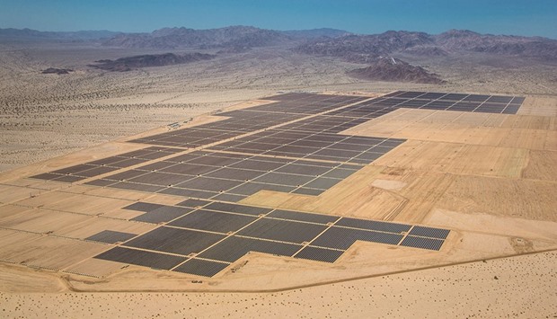 Solar panels are seen in this aerial photograph of First Solaru2019s Desert Sunlight Solar Farm in Mojave Desert, California. For the first time in three years, the largest thin-film panel manufacturer is making panels for less than Chinau2019s biggest producer, justifying more than $3bn in loan guarantees from the US government.