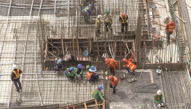 Workers at a construction project in Doha