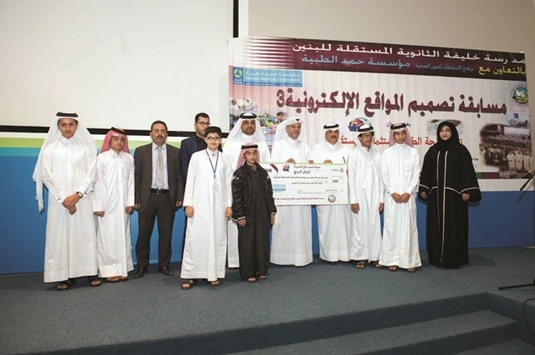 Some of the winning school students and officials with HMC officials.