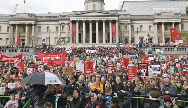 Protesters take part in  rally organised by the Peopleu2019s Assembly Against Austerity in Trafalgar Square.