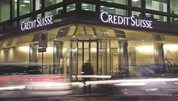 The Credit Suisse logo is seen at its office in Milan. The Securities and Exchange Surveillance Commission said Credit Suisse Securities (Japan) had inadequate systems for managing non-public information about companies.