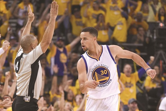 Golden State Warriors guard Stephen Curry (No 30) celebrates after scoring a three-point basket against the Houston Rockets during the first quarter in game one of the first round of the NBA Playoffs at Oracle Arena. PICTURE: USA TODAY Sports