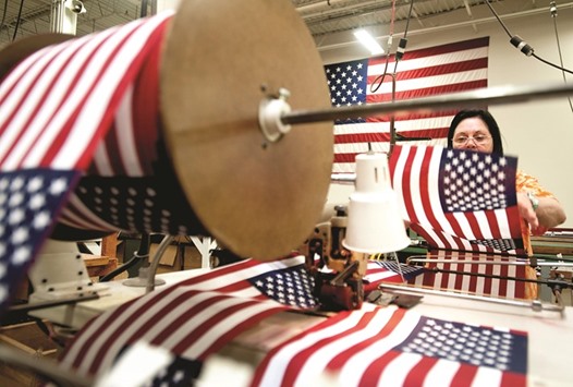 A worker loads up one of the sewing machines with a roll of uncut flags to be sewn together at a flag making company in Coshocton, Ohio, US (file). Taking into account several factors, the pay difference could be just pennies, the studies, from think tanks on different places on the political spectrum, found. Women may make less because they decide to work fewer hours, or because scarce childcare options give them no choice. Some are blocked out of jobs by physical abilities and education. Thatu2019s not to say there isnu2019t discrimination, the studies noted, though itu2019s responsible for a small part of the chasm.