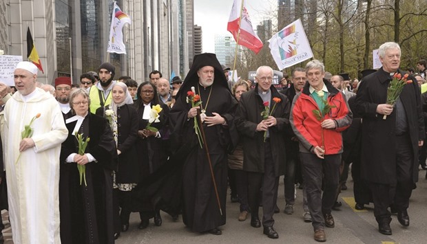 Representatives of different religious and cultural communities take part in the peaceful march in Brussels.
