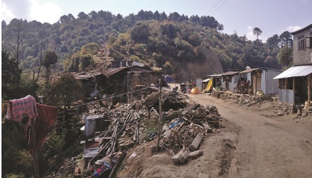 A year after the quake, rubble still litters Dolakha district and much of the country.