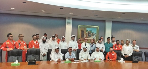 Qatargas multi-disciplinary team with officials.