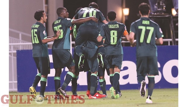 Al Ahli players celebrate after scoring against El Jaish yesterday. The Saudi side defeated the Qatari team 4-1. PICTURES: Noushad Thekkayil