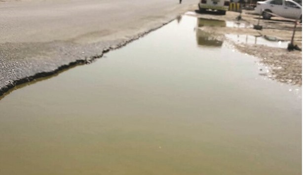 A portion of a road near Al Attiyah Market that was found waterlogged during a visit to the area on Monday.