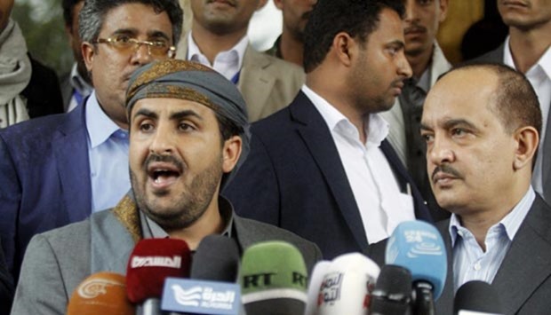 Mohammed Abdul-Salam (left), head of the Houthi delegation to scheduled peace talks in Kuwait, speaks at a news conference at Sanaa Airport on Wednesday.