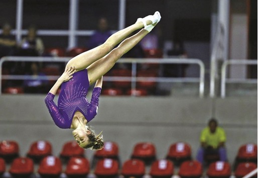 Susana Kochesok of Russia performs the trampoline routine during the womenu2019s team competition during the Olympic Qualifier in Rio de Janeiro, Brazil on Tuesday. Frenchwomen Marine Jurbert and Lea Labrousse secured the womenu2019s honours on a total of 46,000 points, 0.500 in front of Russiau2019s Susana Kochesok and Anna Kornetskaya. (Reuters)