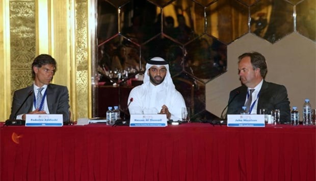 Hassan al-Thawadi, centre, speaking at the Asian Regional Forum on Business and Human Rights in Doha yesterday.