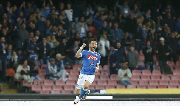 Napoliu2019s Dries Mertens celebrates after scoring a goal against Bologna.