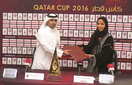 Hassan al-Kuwari, Director of Events and Acting Director of Sales for QSL and Fatima Sultan al-Kuwari, Director, Community and Public Relations,Ooredoo.