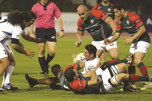 Action from Tuesdayu2019s match between Lebanon (in green and white) and Iran. Lebanon won 34-12.