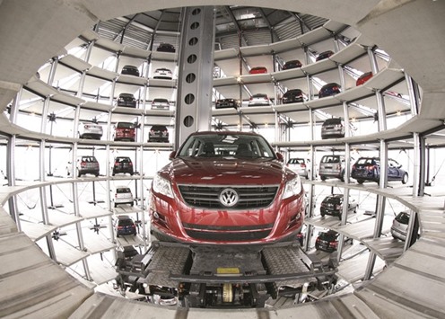 A new Volkswagen Tiguan is stored at the CarTowers in the theme park u2018Autostadtu2019 in Wolfsburg. Shares in the German carmaker topped the Frankfurt gainers, rising 6.6% to u20ac120.90, yesterday.