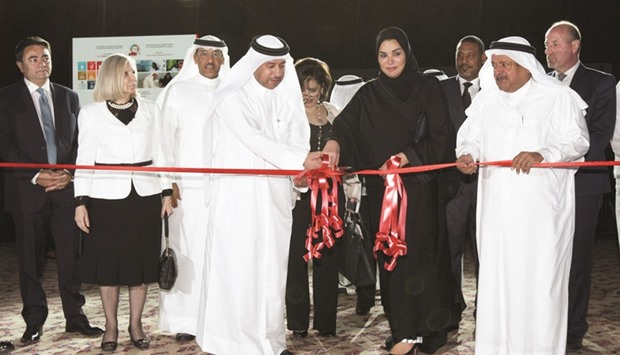 HE the Minister for Administrative Development and Labour and Social Affairs Dr Issa Saad al-Juffali al-Nuaimi and Qatar Social Work Foundation chief Munira bint Nasser al-Misnad jointly inaugurate the Arab Conference on The Role of Civil Society yesterday. Also seen is prominent Qatari businessman Sheikh Faisal bin Qassim al-Thani.