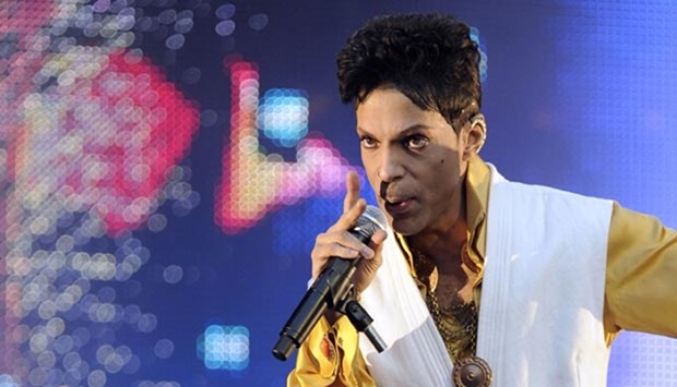 US singer and musician Prince performing on stage in this file photo