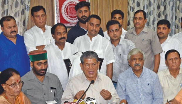 Uttarakhand Chief Minister Harish Rawat addresses a press conference in Dehradun yesterday after the high court quashed Presidential Rule in the state.