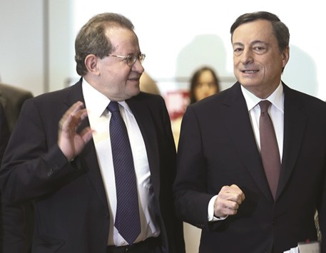 European Central Bank president Mario Draghi, right, and vice president Vitor Constancio arrive for a news conference at its headquarters in Frankfurt. The ECB held the rate on marginal lending facility unchanged at 0.25% and the rate on the deposit facility steady at minus 0.40% yesterday.