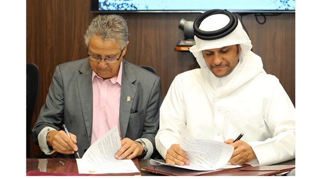 Qatar Basketball Federation president Sheikh Saoud bin Abdulrahman al-Thani (R) and his Brazilian counterpart Carlos Nunez signed an agreement of mutual co-operation in Doha yesterday.
