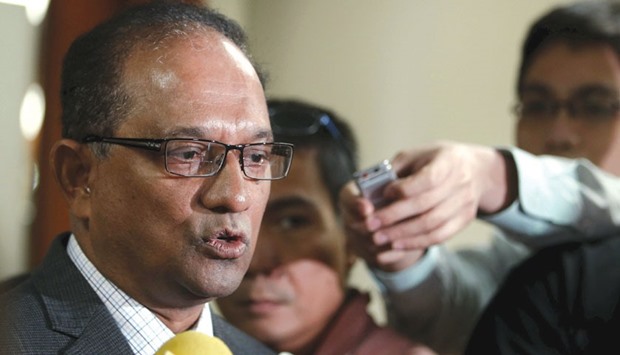 Bangladeshu2019s ambassador to the Philippines John Gomes talks to reporters after attending a senate hearing on the money stolen from Bangladeshu2019s central bank, at the Philippine Senate in Manila.