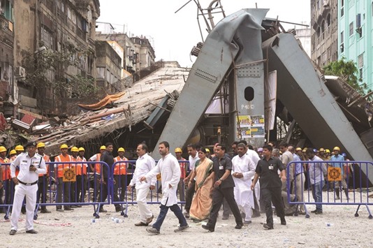 Congress vice president Rahul Gandhi visits the site of the collapsed flyover in Kolkata yesterday.