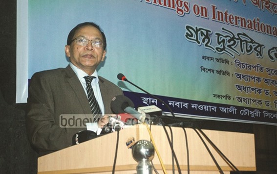 Chief Justice Surendra Kumar Sinha speaking at a discussion in Dhaka yesterday.