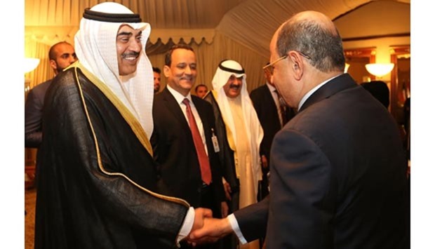 Kuwaiti Foreign Minister Sheikh Sabah al-Khaled al-Sabah (left) and United Nations Special Envoy to Yemen Ismail Ould Cheikh Ahmed (centre) greeting members of Yemeni rebel and government delegations upon their arrival at Bayan palace before the restart of the UN-brokered peace talks on Friday.