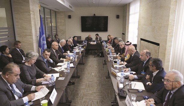 A meeting between UN Syria envoy Staffan de Mistura and members of the Syrian interior opposition during the peace talks at the United Nations Office in Geneva yesterday.