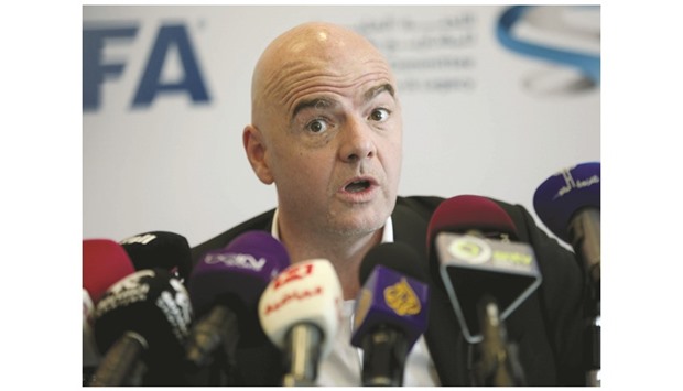 FIFA president Gianni Infantino addresses a press conference during his first visit to Qatar since becoming the head of the global football body in February.