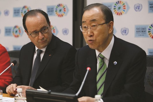 UN Secretary General Ban with Franceu2019s President Hollande during a press conference at the United Nations yesterday. Hollande signed the Paris climate agreement, the first leader from a record 171 countries to endorse the accord on combatting global warming.