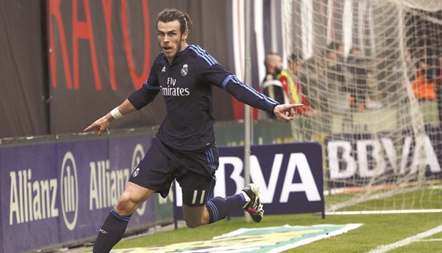 Real Madrid's Gareth Bale celebrates after scoring a goal against Rayo in the La Liga yesterday.
