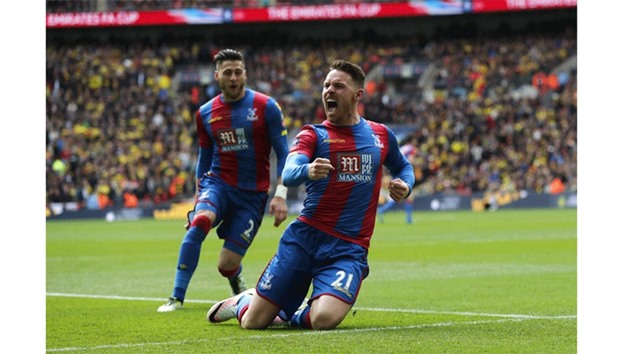 Crystal Palaceu2019s Connor Wickham (right) celebrates with Joel Ward after scoring their second goal. (Reuters)