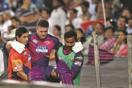 Kevin Pietersen is helped off the field after retiring hurt during Rising Pune Supergiantsu2019 IPL game against Royal Challengers Bangalore in Pune last Friday. In this season, Pietersen had scored 73 runs from four innings at an average of 36.50 and strike rate of 119.67. (BCCI)