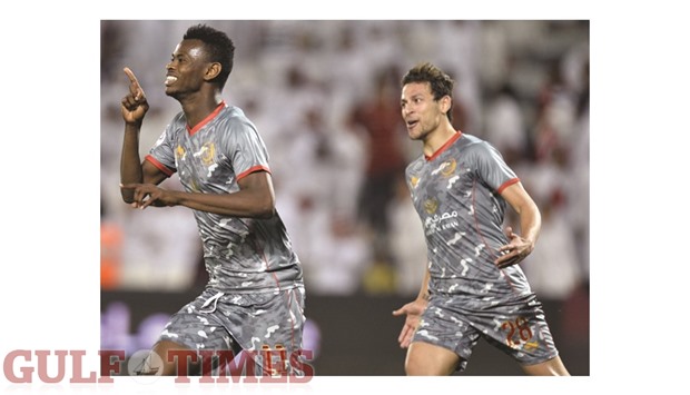 Lekhwiyau2019s Mohamed Muntari (left) celebrates his goal with teammate Youssef Msakni during the Qatar Cup match against Al Rayyan yesterday. PICTURES: Noushad Thekkayil & Shemeer Rasheed