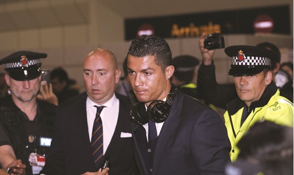 Cristiano Ronaldo arrives at Manchester Airport. (Reuters)
